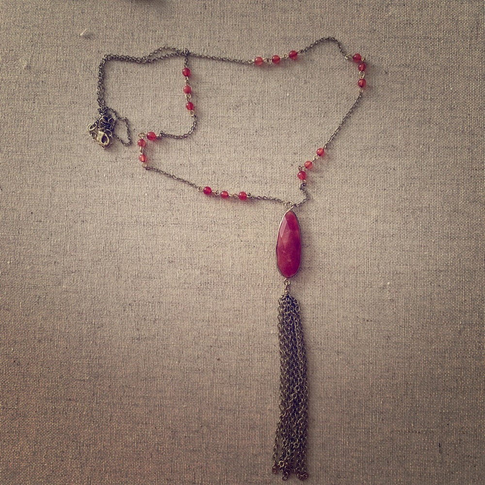 Red stone and gold tassel necklace